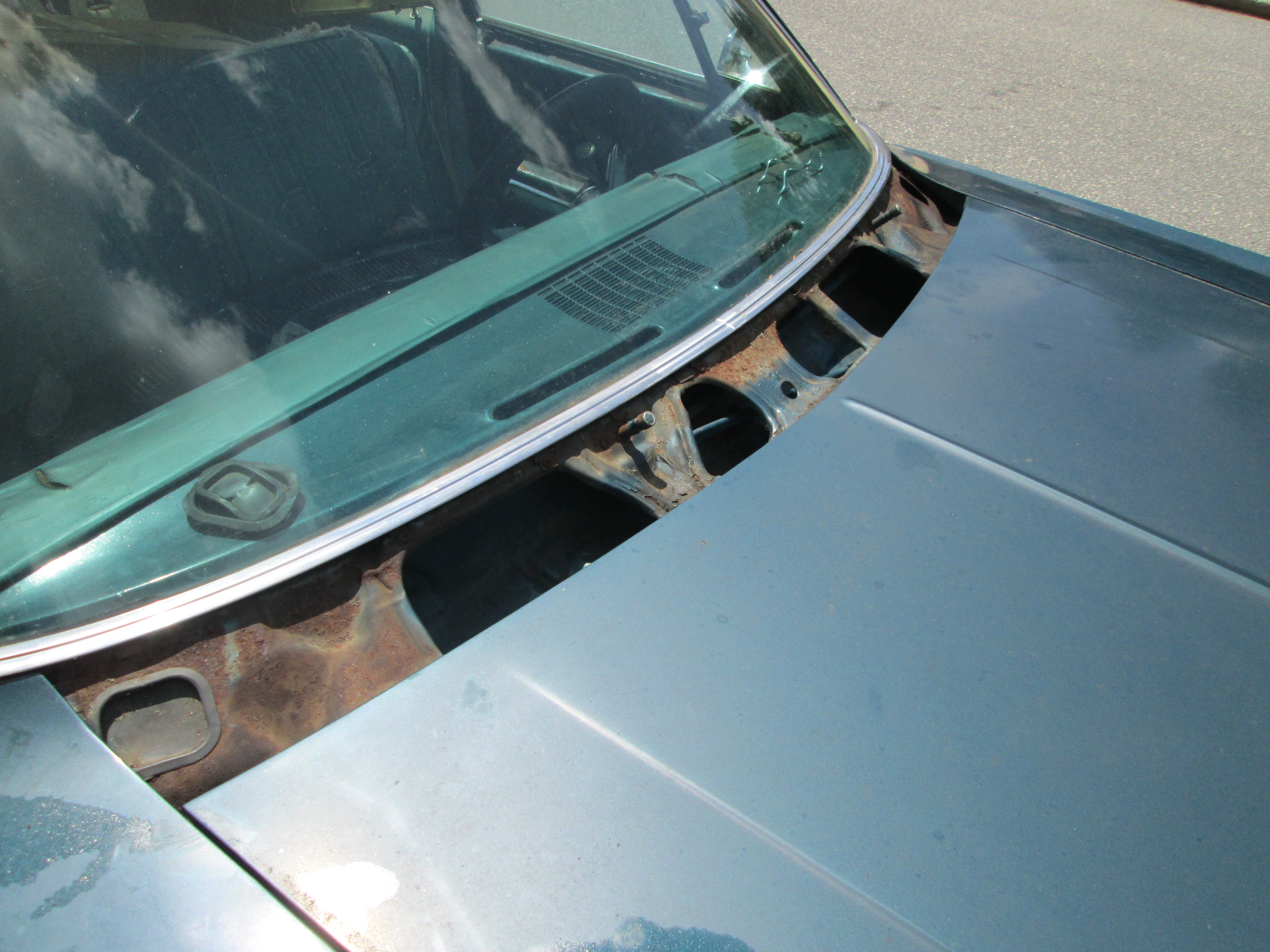 WindShield wiper area without the cowl (face plate). Had to remove the wiper blades to take this off. This was removed to install the nozzles